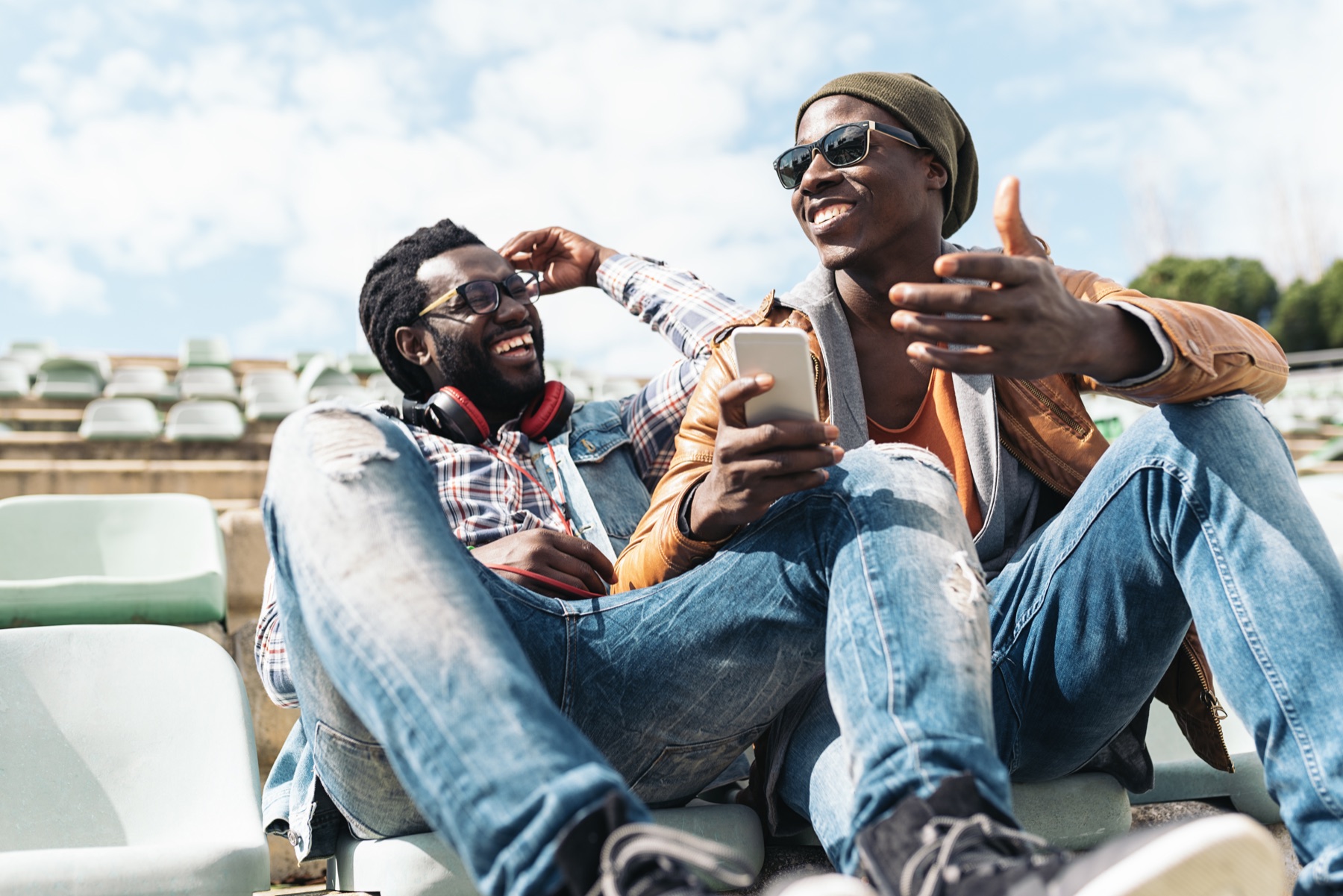 Friends enjoying music together outdoors